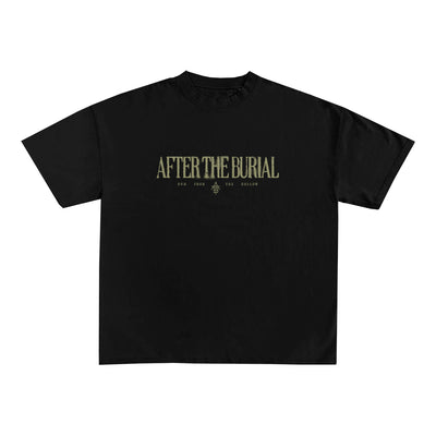 A black Comfort Colors t-shirt by After The Burial, featuring bold distressed yellow lettering across the chest, with smaller text and a graphic design below—a standout printed garment.