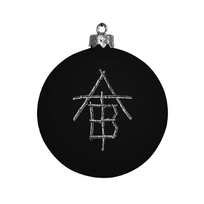 Image of a black ornament against a white background. The top part of the ornament where it is hung is silver. The rest is black. In the center of the ornament is a black/white/gray after the burial ATB logo. It looks like sticks that are laid out to make the letters ATB in a descending order. 